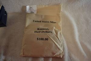 lot 388 image: $100 Bag of 2001 Kennedy Half Dollars, Half D-Mint and Half P-Mint