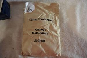 lot 389 image: $100 Bag of 2001 Kennedy Half Dollars, Half D-Mint and Half P-Mint