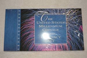 lot 540 image: US Millennium Coinage and Currency Set $1 Coin, Silver $1 Coin and $1 Bill