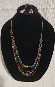lot 553 image: Signed,boxed Lia Sophia (1986-2014) Share The Love Of Jewelry mixed metals (Glass & Metal beads) 20L multi strand chain w 3 extender and matching ear wire earrings. 26L Total length 32L