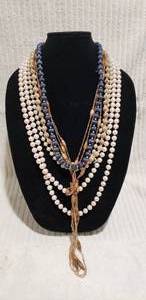 lot 566 image: (5) Fashion necklaces. Includes a pair of continuous pearl necklaces 70L (Opera Length) and 26L