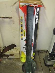 lot 94 image: Black & Decker electric weed  eater with box, ELECTRIC LEAF BLOWER