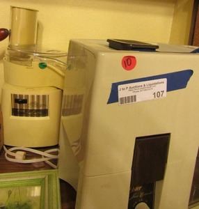 lot 107 image: Oster Juicer food crafter with charable slices