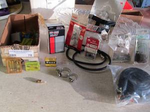 lot 78 image: Hose, clamps, fuses grommet kit, door handle and more