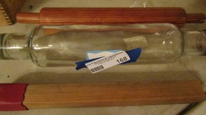 lot 168 image: GLASS ROLLING PIN, Wooden ROLLING PIN (1940S)  and MATCH LIGHTER