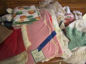 lot 216 image: table cloths, kitchen towels  & more.