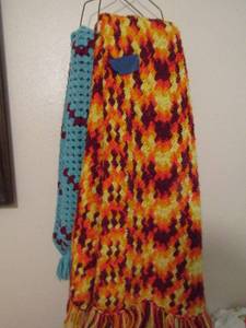 lot 250 image: Handmade afghans- one is Orangeyellow, RedYellowTan, Pillow and the blue maroon afgan