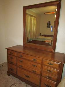 lot 32 image: SUMTER CABINET CO. Solid Hard Rock Maple  10 drawer dresser  with mirror 32x54x19 mirror 43x37