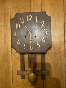 lot 54 image: WOODEN WALL CLOCK  by National Clock mfg. co. Chicago #19 26x13 has a key