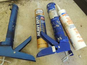 lot 303 image: Caulking gun and caulk