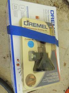 lot 306 image: Dremel rotary tool  & Multi purpose cutting kit