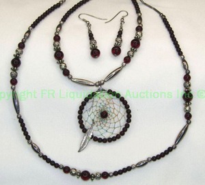 lot 14 image: Sterling Silver and Garnet