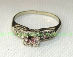 lot 77 image: 14K white gold and diamond