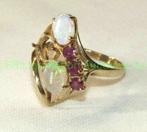 lot 170 image: 14K Gold white opal and ruby