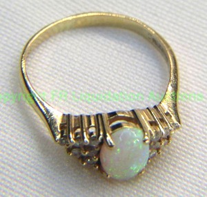 lot 176 image: 14K Gold PLUMB white opal and diamond