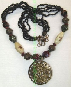 lot 185 image: Brass and bead