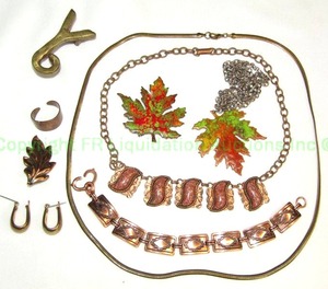 lot 204 image: Copper and brass jewelry