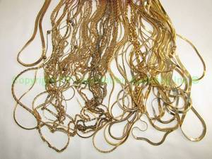 lot 228 image: Gold tone necklaces