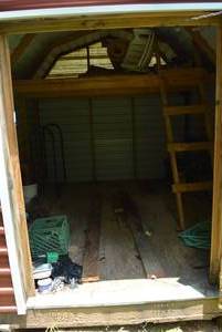 lot 15 image: Contents of Shed Patio Chairs, Weed Trimmer, Chains and More