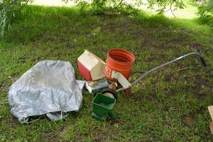 lot 18 image: Spreader and Hand-held Spreader, Tarp, Cooler and Radar Detector