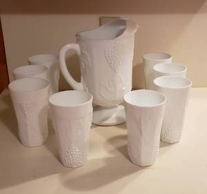 lot 77 image: Milk Glass Paneled Grape Design Pitcher and Tumbler Set