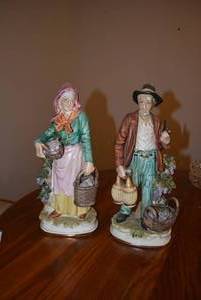 lot 144 image: Man and Woman Ceramic Figurines