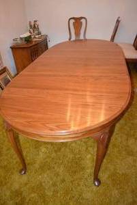 lot 146 image: Solid Oak Dining Table with 2 Leaves, Stamped Slides by Walter of Wabash, Jamestown Tenn., 66 x 44 x 29 Tall, 2 - 15 Leafs, Fully Extended 96 x 44