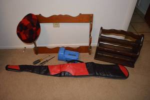 lot 153 image: Gun Case, Gun Rack, Magazine Rack, Plaid Hat and Tools