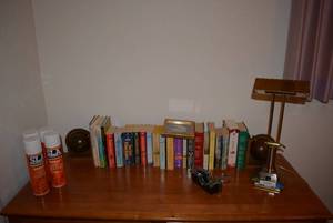 lot 166 image: Contents of Desktop Desk Lamp, Books, Globe Book Ends, SLA Spray Cans