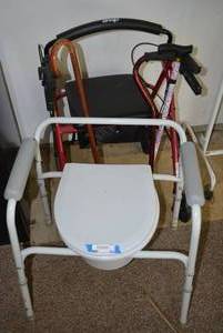 lot 35 image: Drive Seated Walker, Canes and Portable Potty Chair