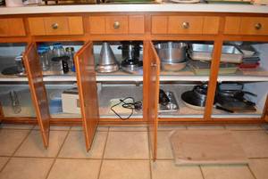 lot 89 image: Contents of Cabinets Baking Pans and Misc. Kitchen Items