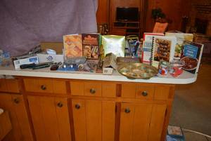 lot 92 image: Misc. Lot Cook Books, Light Bulbs, Tape, Tools and More