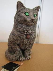 lot 8 image: Sitting  Cat candle holder lamp 2014 by Pena