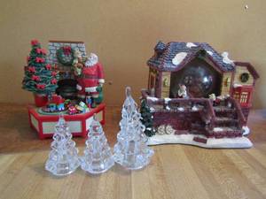 lot 32 image: Christmas scene by Enesco winding spring needs replaced, Santa workshop musical (needs batteries, 2 ACC handmade christmas trees