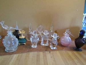 lot 53 image: Lot of various colored perfume bottles