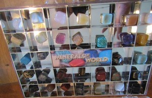 lot 60 image: World  minerals arranged in order in case