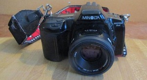 lot 69 image: MINOLTA  MAXXUM 3Xi camera w mickey mouse camera strap