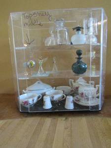 lot 81 image: 3 tier rotating display shelf mini porcelain tea set 2 august peridot angels old perfume bottles