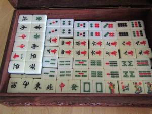 lot 135 image: MAHJONG TILES IN ORNATE Wooden BOX