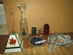 lot 193 image: Pear in a bottle, glass shade  glass plate and more