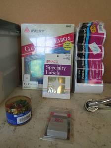 lot 194 image: Clear tote with lid full of office supplies