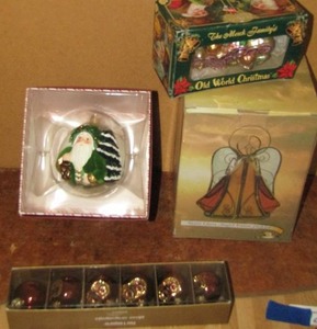 lot 203 image: Christmas ornaments- pier one NIP, Mereck family, Evergreen Father hallmark and stained glass angel