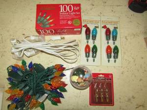 lot 215 image: Box of christmas lights, ornaments, gift boxes and home phone