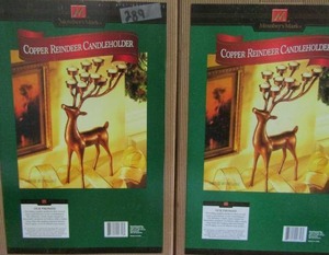 lot 289 image: 2 NIB copper reindeer candle holders by 