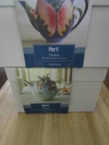lot 288 image: 2 Pier 1 porcelain teapots NIB