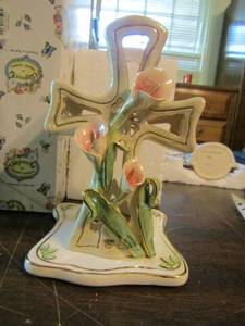 lot 310 image: Apple core blue sky killer whale tail light candle holder and tea light cross