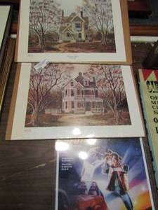 lot 466 image: 2 unframed Randy Saunders signature collection Grandmas House and yard work plus back to the future poster in plastic poster frame