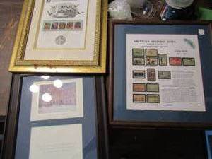 lot 468 image: 4 framed picture- Historical flag stamps, Historic site stamps, Movie monster stamps and the white house with the Clintons signatures
