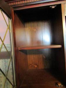 lot 463 image: 2 piece china hutch. Top has double doors with 2 shelves 59x46x19. Bottom has 6 drawers double door with 2 shelves 64x33x19