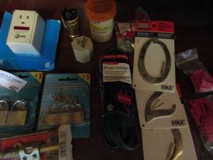 lot 482 image: Household hardware- 6 small locks, outlet covers, wire brush, extension cord,